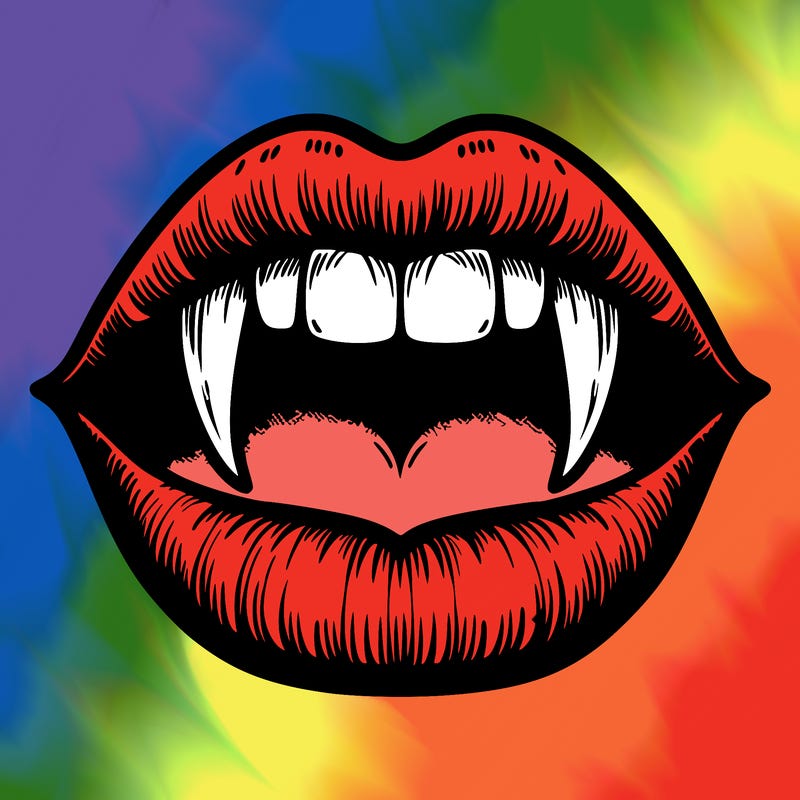 lips with vampire teeth