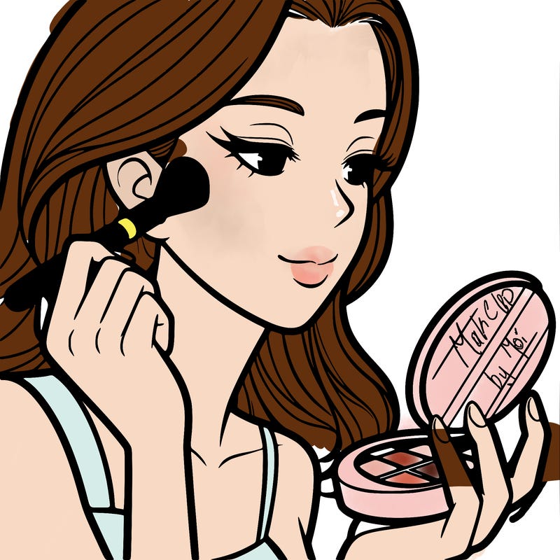 little girl putting on makeup