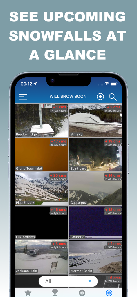 A mobile app screen showing a grid of live ski resort webcams with upcoming snowfall accumulation data overlays
