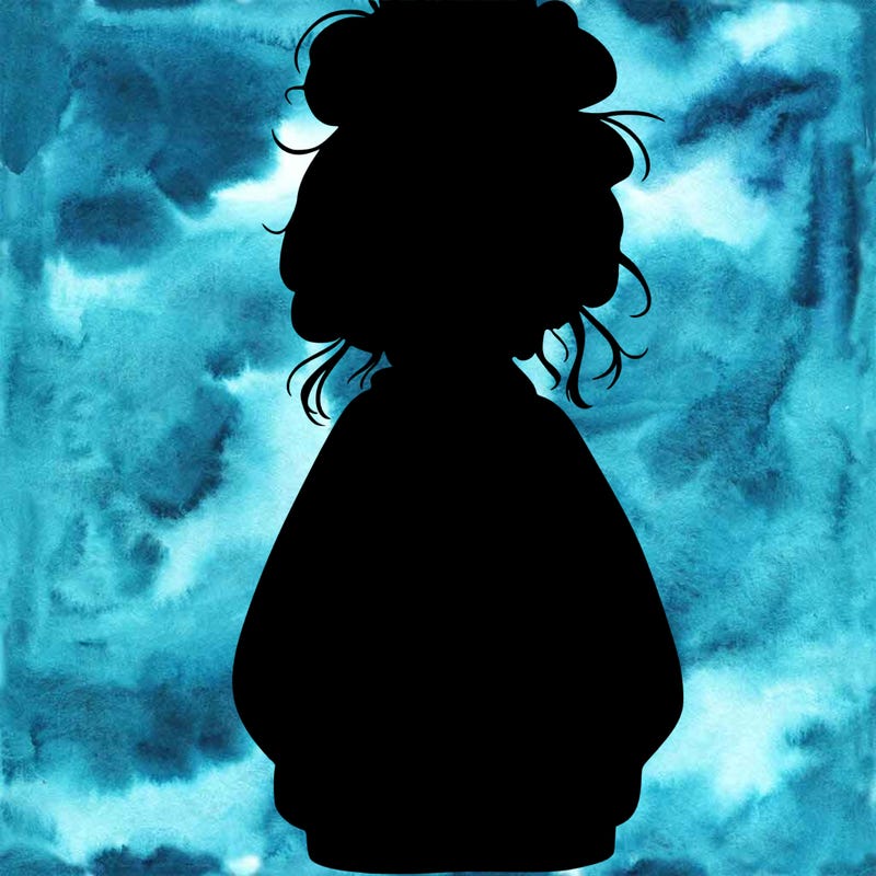 girl with baggy sweatshirt and messy bun