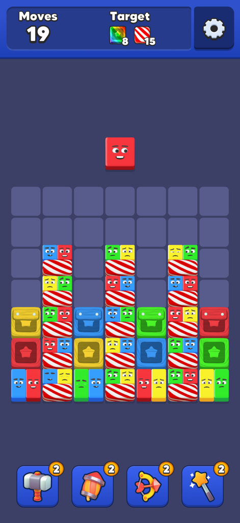Gameplay screen of Drop Jelly showing colorful blocks with faces and power up icons