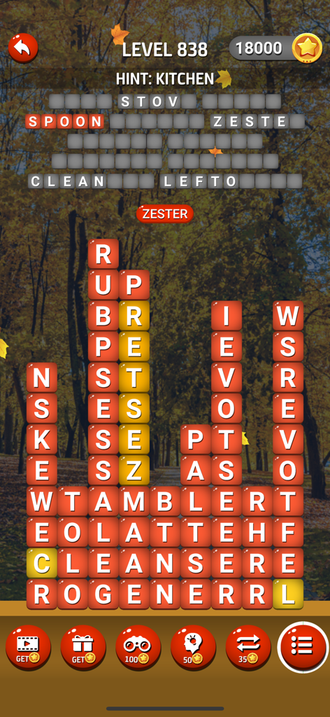 Word Streak: Play Daily Puzzle - Gameplay von Word Streak zeigt Wortblöcke und einen Küchenhinweis auf einem Herbsthintergrund.