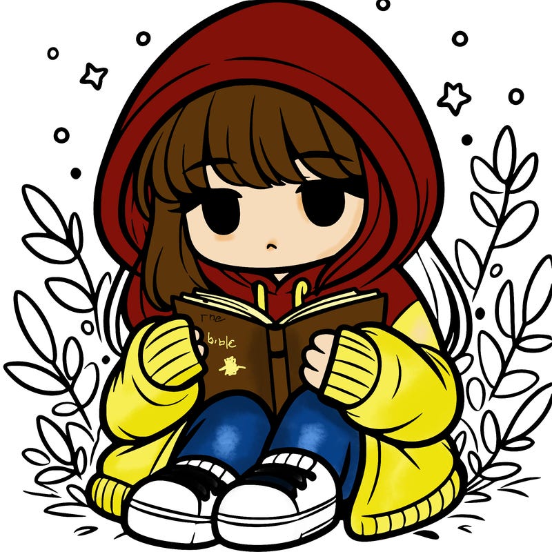 girl in oversized hoodie reading a book