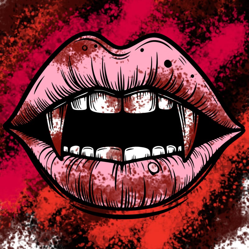 lips with vampire teeth