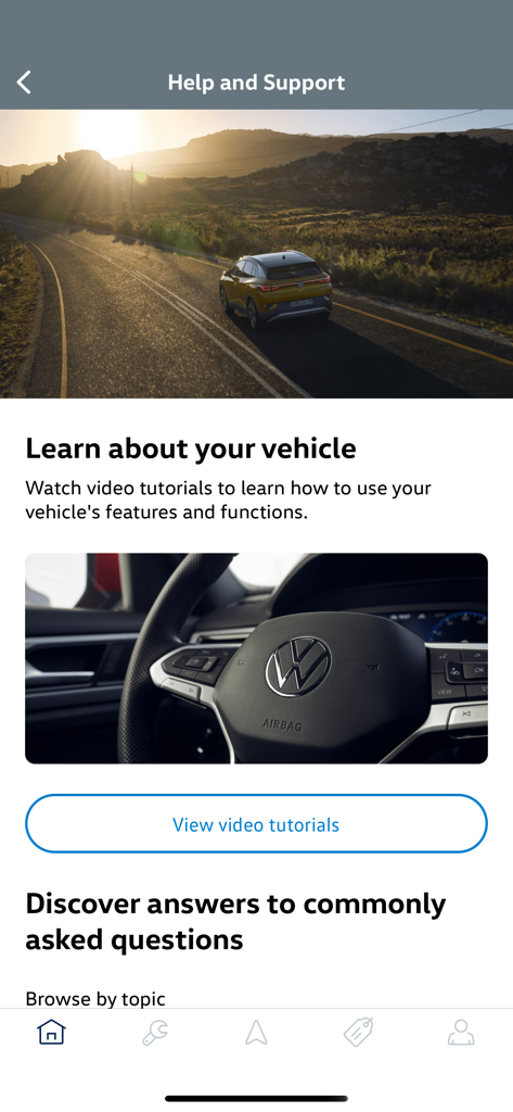 Help and Support screen in the myVW app featuring vehicle video tutorials and common questions.