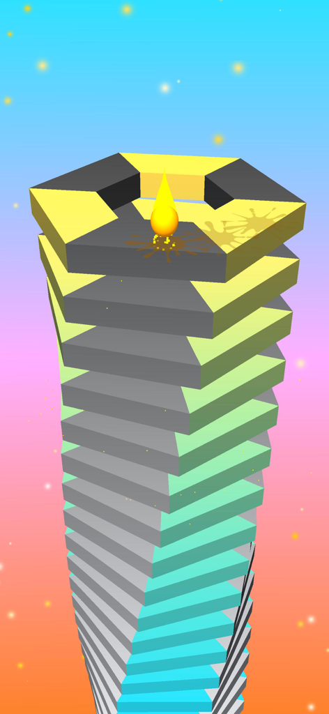 A glowing yellow ball on a colorful rotating stack of blocks in the Crush Ball mobile game