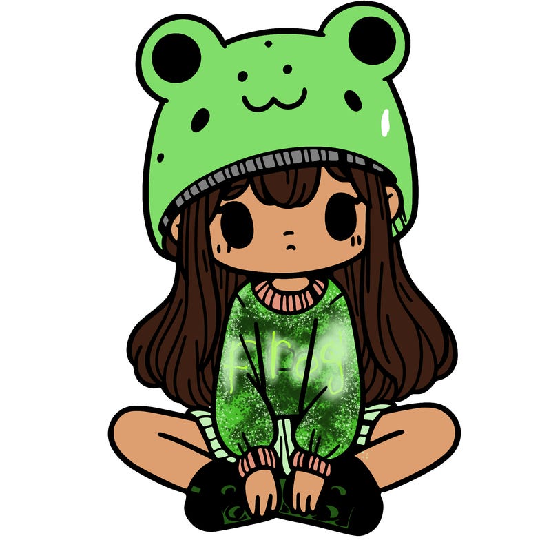 a girl wearing a frog hat and some frog socks