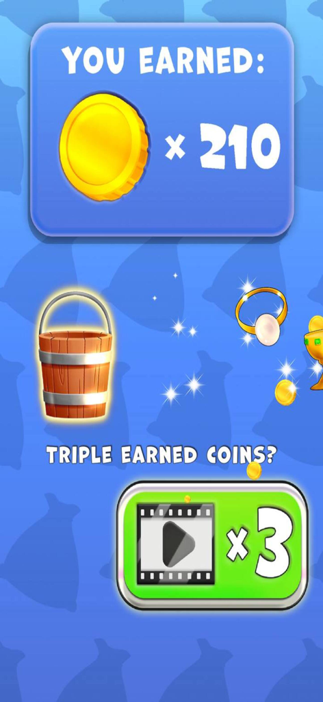 Wishing Well : Wonders - In-game rewards screen in Wishing Well Wonders showing earned coins and a triple reward option.