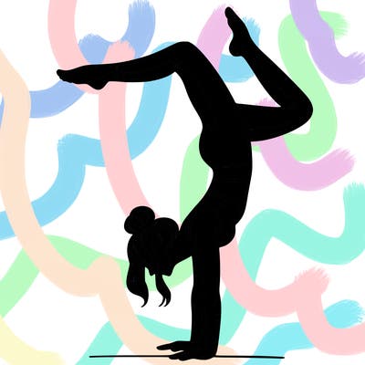 a woman doing a handstand