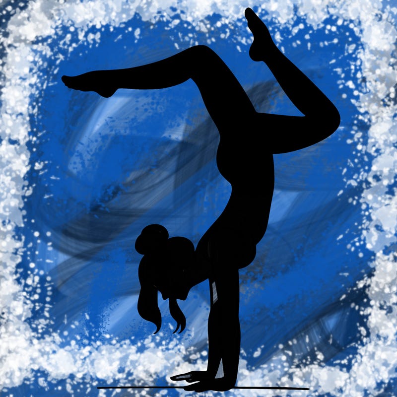 a woman doing a handstand