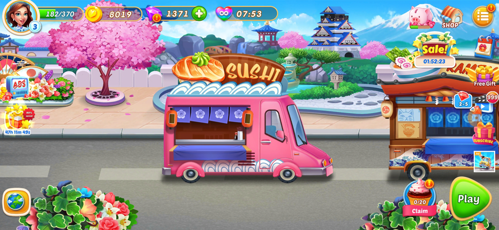 A pink sushi food truck parked in a Japanese themed level with cherry blossoms and Mount Fuji in the background