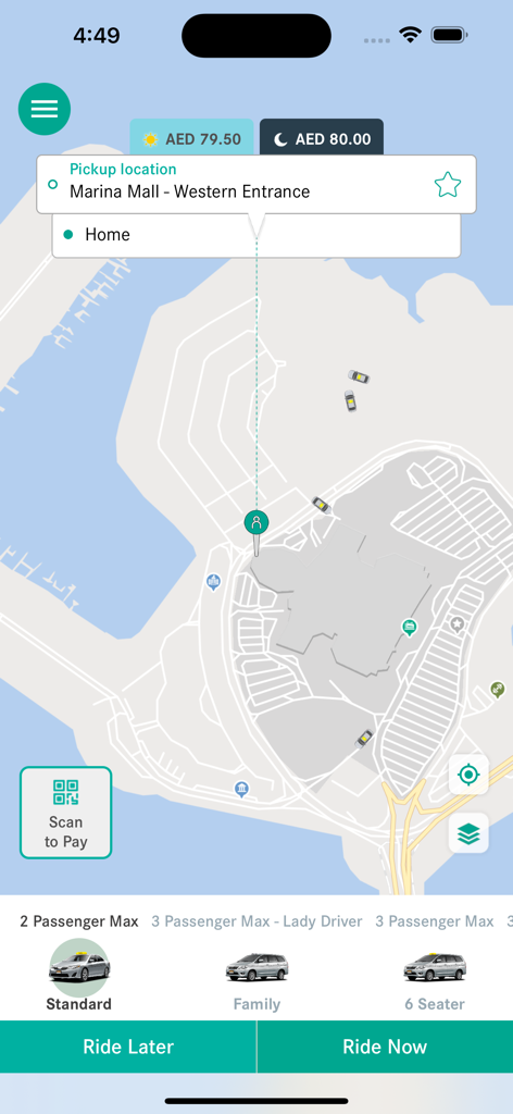 Abu Dhabi Taxi - Booking screen of the Abu Dhabi Taxi app showing a map with pickup at Marina Mall and options for different vehicle types
