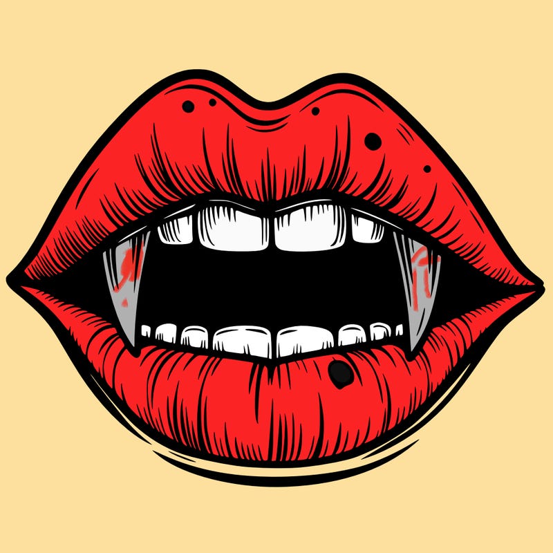 lips with vampire teeth