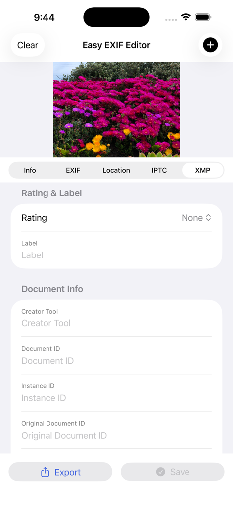 Easy Exif Editor - Interface of the Easy Exif Editor app showing XMP metadata fields like rating and document info for a photo of pink flowers