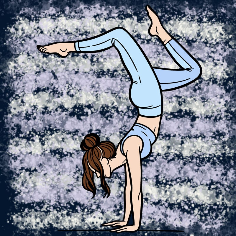 a woman doing a handstand