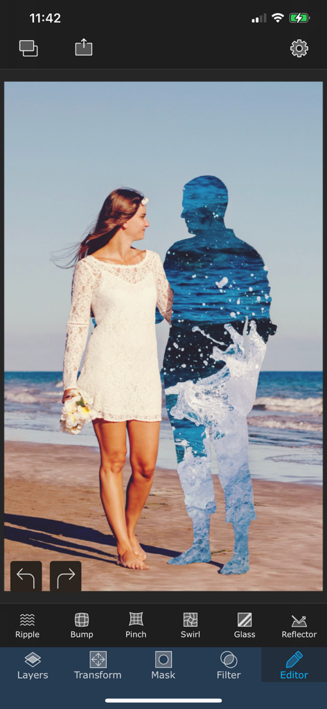 A surreal double exposure photo edit in the Superimpose app showing a woman walking on a beach next to a man's silhouette filled with water textures.