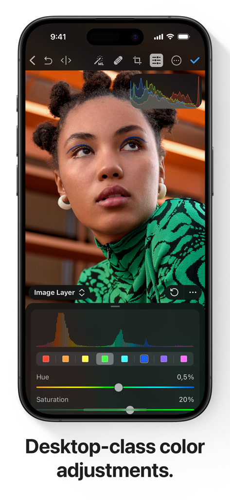 iPhone screen showing professional color adjustment tools and a portrait in Photomator.