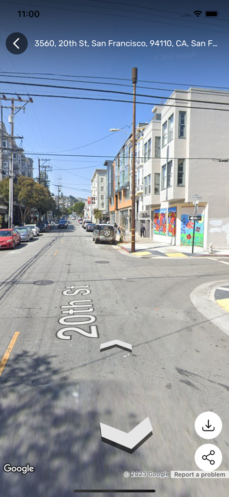 A high-definition 3D street view panorama of 20th Street in San Francisco showing urban buildings and parked cars.