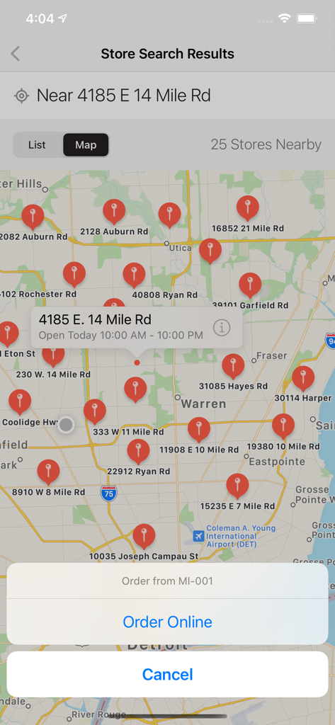 Uma interface de mapa no aplicativo móvel Jet's Pizza mostrando vários locais de lojas perto de Warren Michigan com uma opção para pedir online