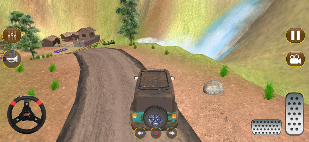 Offroad mud truck driving on a dirt road with mountain and waterfall views