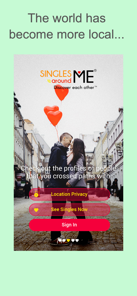 SinglesAroundMe dating app home screen featuring a couple holding heart balloons and sign-in buttons