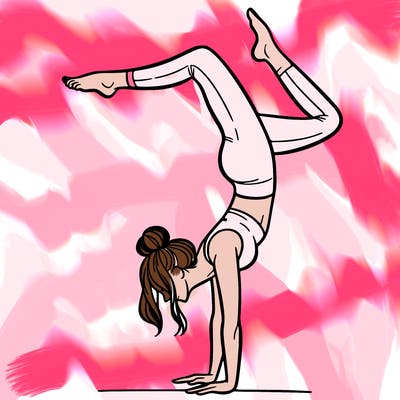 a woman doing a handstand