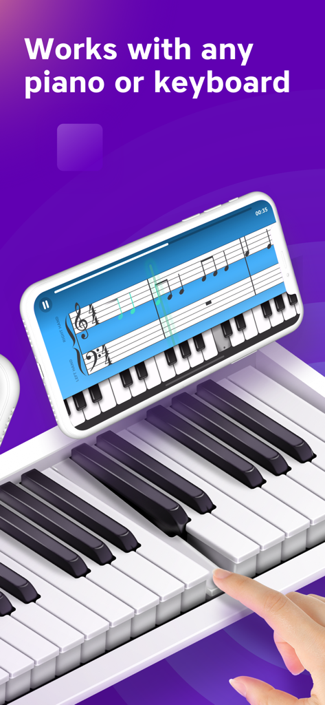 Piano Academy by Yokee Music - A smartphone showing the Piano Academy app placed on a physical piano keyboard while being played