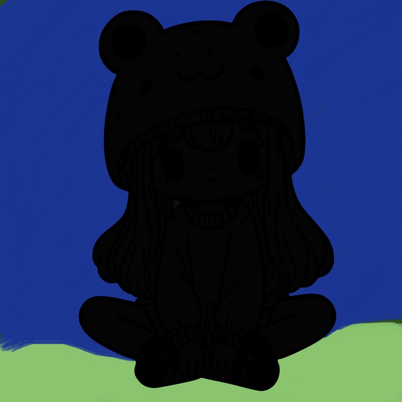 a girl wearing a frog hat and some frog socks