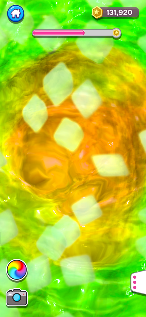 Grüne und gelbe Schleimmischung mit Gummibärchen-Dekorationen in der Super Slime Simulator App