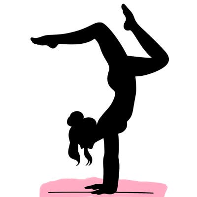 a woman doing a handstand
