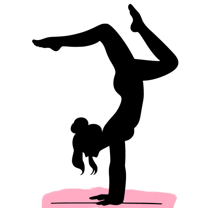 a woman doing a handstand