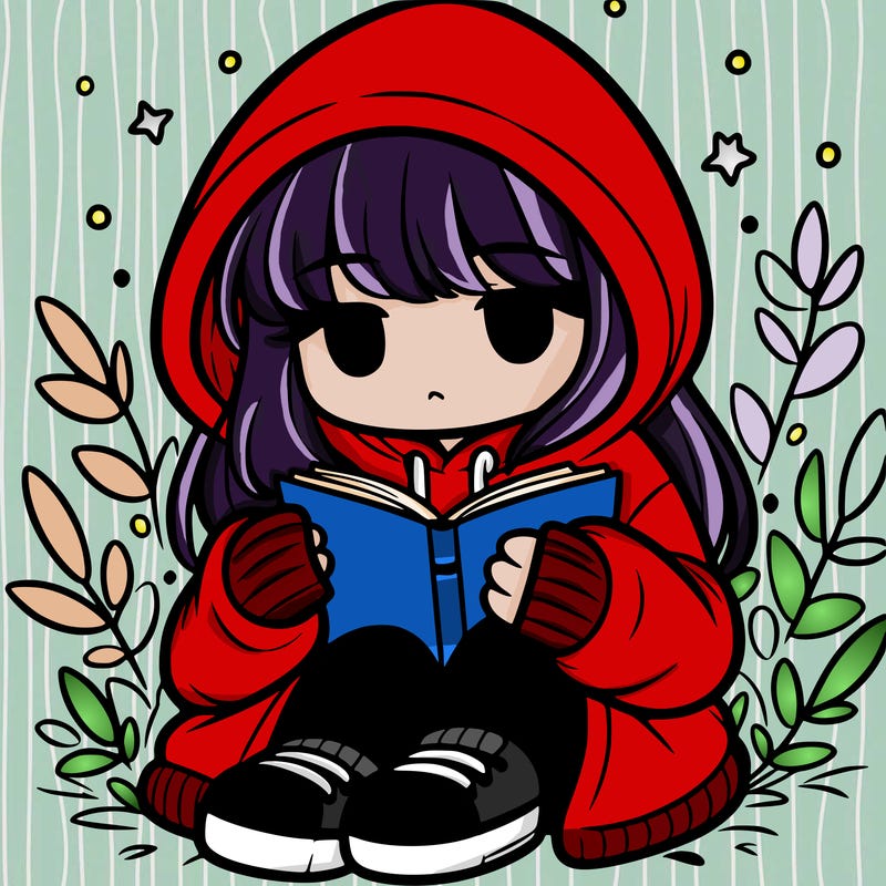 girl in oversized hoodie reading a book