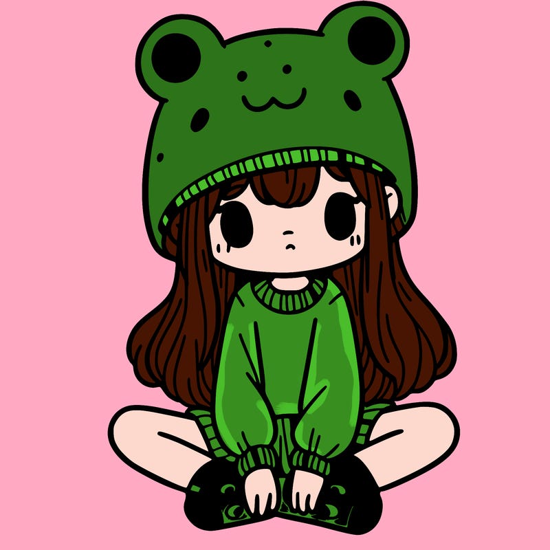 a girl wearing a frog hat and some frog socks