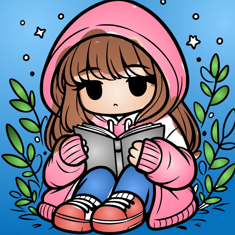 girl in oversized hoodie reading a book