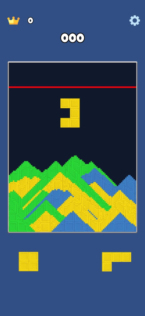 Captura de pantalla de jugabilidad de Sandy Blocks mostrando un bloque amarillo cayendo sobre pilas de arena de colores en un diseño estilo Tetris.