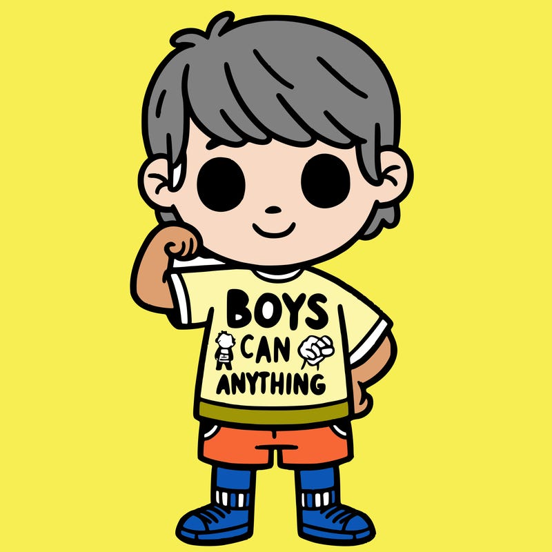 boy, wearing a shirt saying boys can do anything.