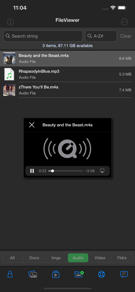 FileViewer USB for iPhone - Interfaz de la aplicación FileViewer mostrando una lista de archivos de audio y un reproductor multimedia integrado en iPhone.