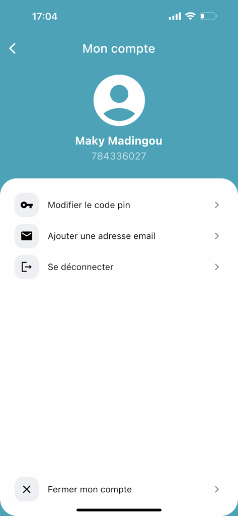 User account settings screen in Wizall Money app displaying profile information and menu options