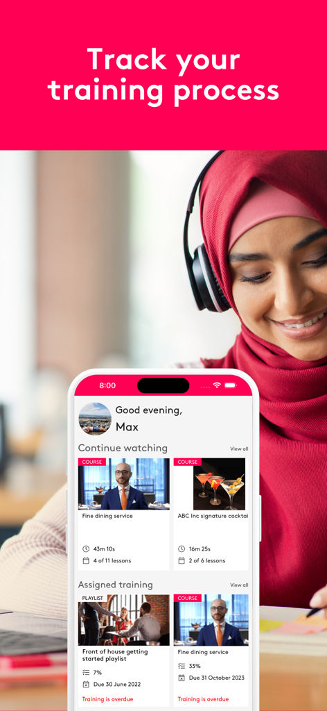Typsy Mobile - A hospitality worker using the Typsy app on a smartphone to track their training progress and assigned courses.