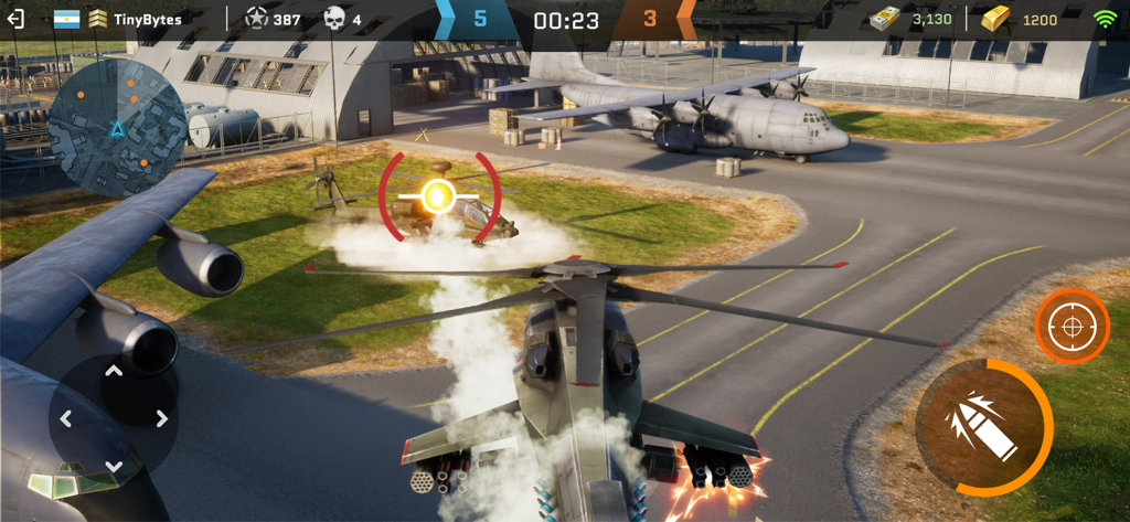 Helicopter aerial dogfight over a military airfield with transport planes and hangars