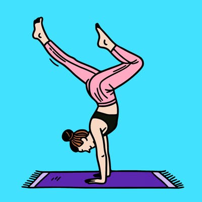 a woman doing a handstand
