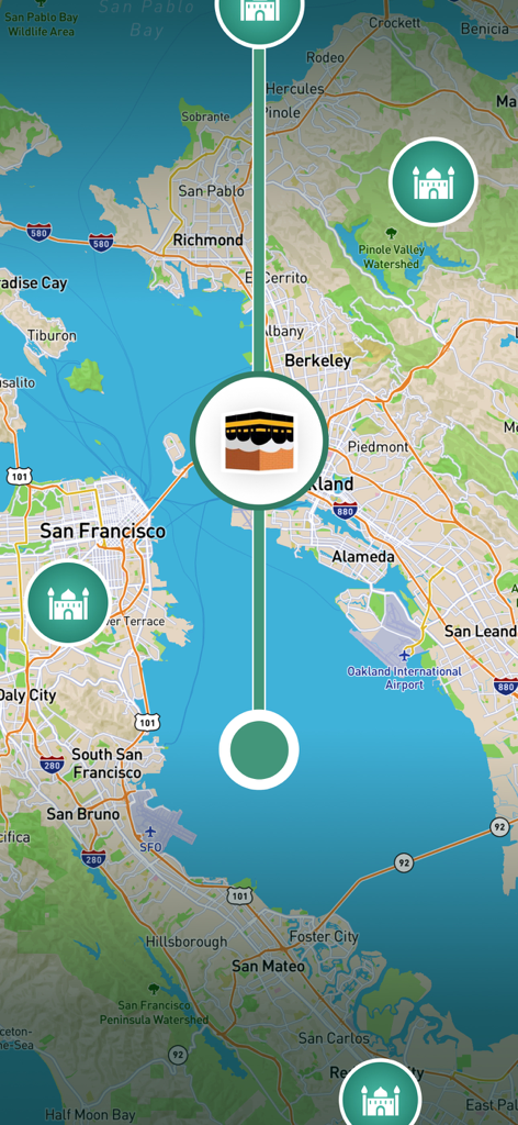 Qibla Compass - Qibla Locator - Une interface cartographique montrant la direction de la Qibla vers la Kaaba et des icônes de mosquées à proximité dans la région de la baie de San Francisco.