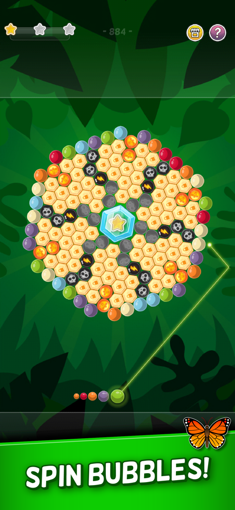 Gameplay screen of Bubble Cloud showing a spinning hexagonal cluster of colorful bubbles in a jungle themed setting with the text Spin Bubbles