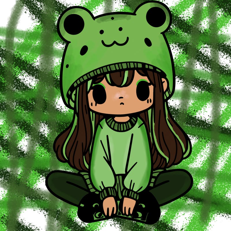 a girl wearing a frog hat and some frog socks