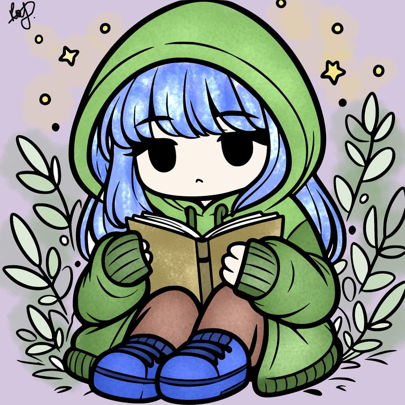 girl in oversized hoodie reading a book
