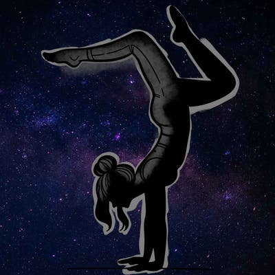 a woman doing a handstand