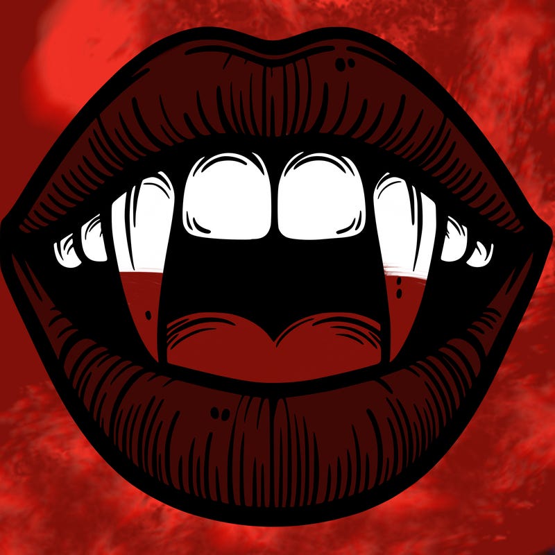 lips with vampire teeth