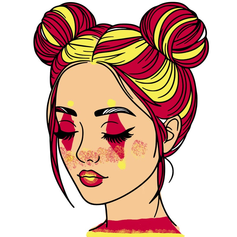woman with hair buns
