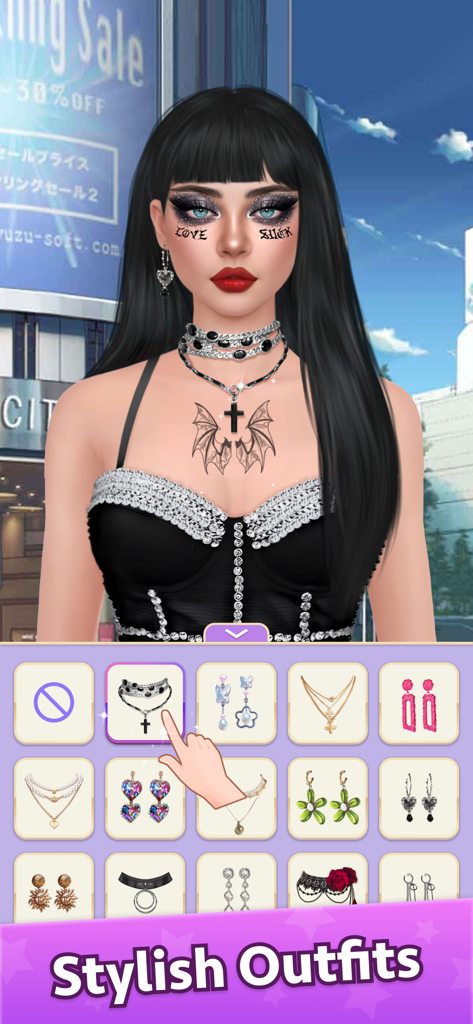 Makeover Artist-Makeup Games - Makeover Artistアプリのゴシックメイクとタトゥーをしたキャラクター。ネックレスとイヤリングを含むジュエリー選択メニューが表示されている。