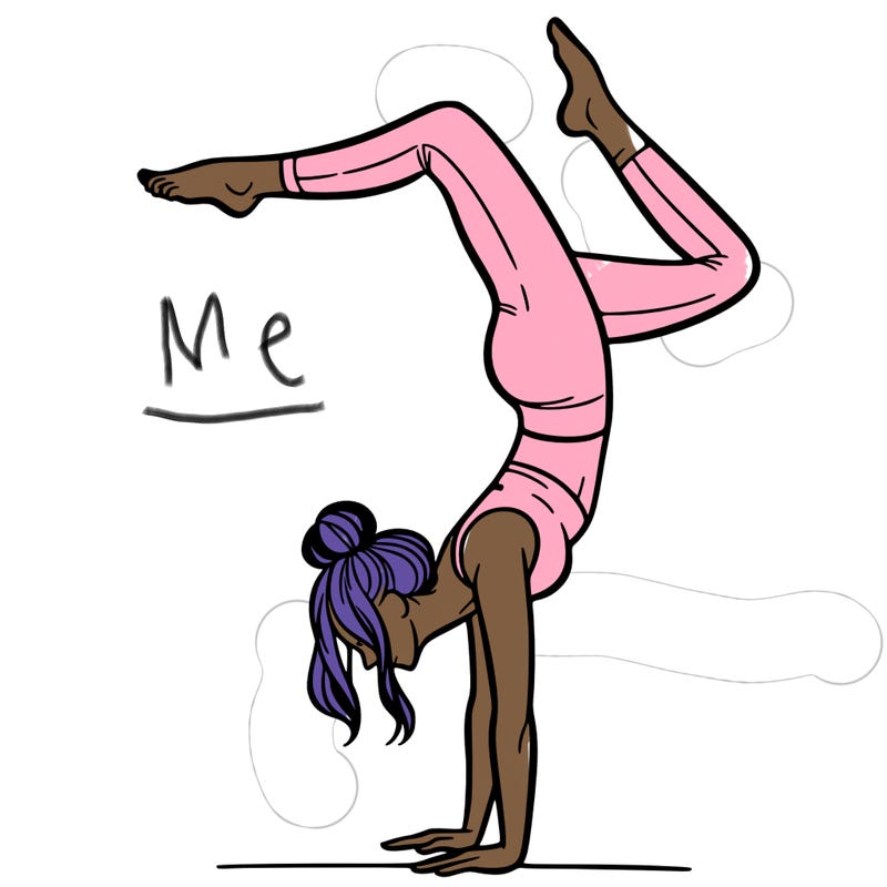 a woman doing a handstand